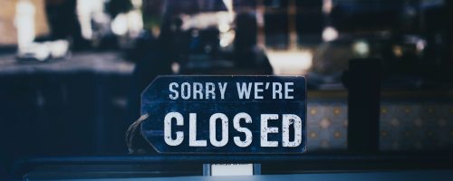 close-up-photo-of-sorry-we-re-closed-sign-on-glass-window-2467649